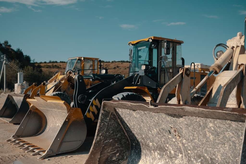 Heavy machinery in quarry. Building materials mining