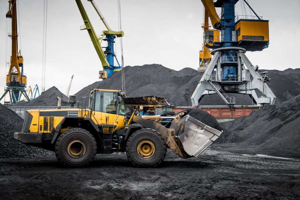 Work in port coal handling terminal.